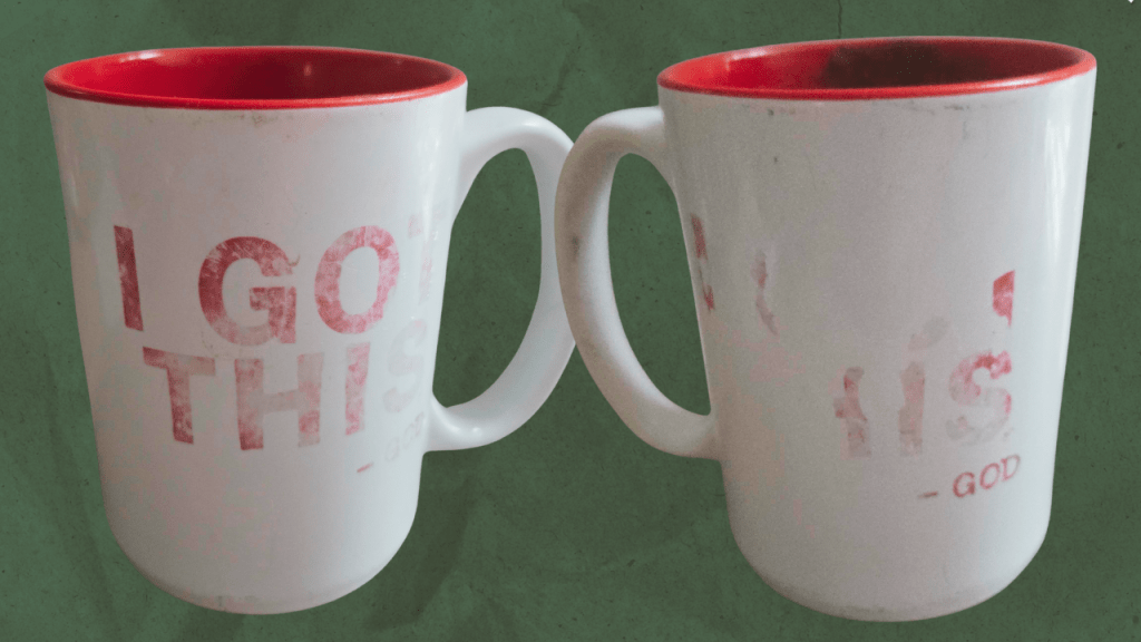 A coffee cup that says "I Got This" God. Test is faded, and barely legible 